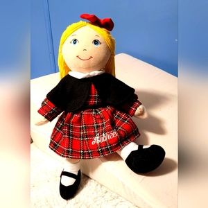 Personalized Blonde 17' Rag Doll.She wears a red, white, yellow, and black dress